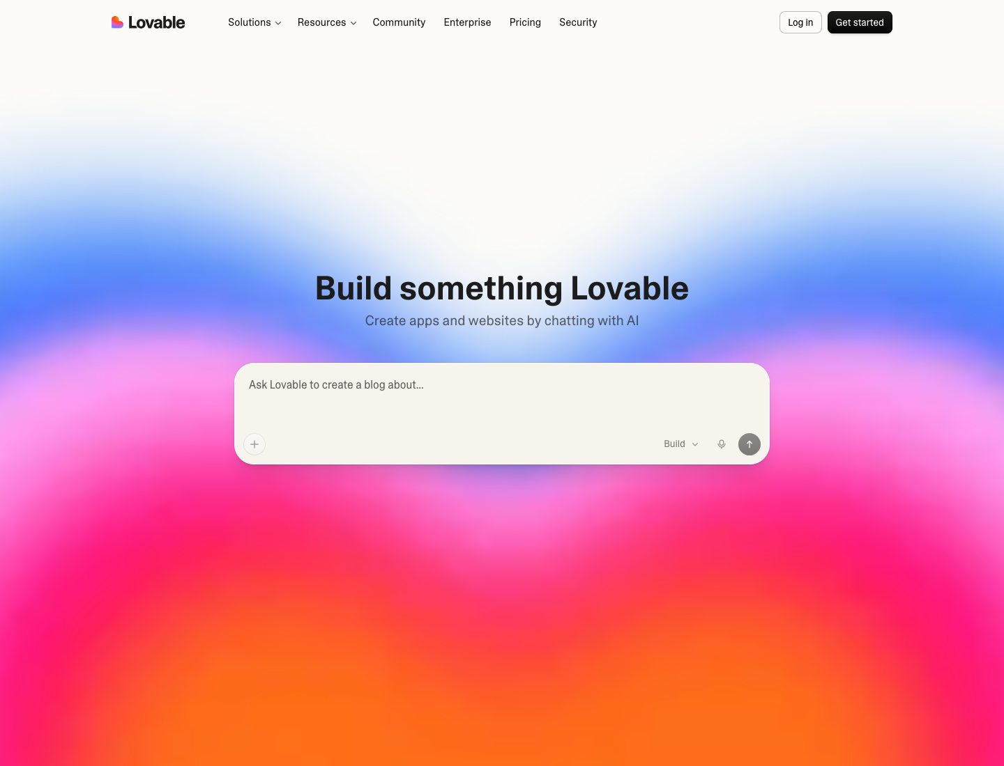 The Lovable homepage with the headline Build something Lovable, a sub-line that reads Create apps and websites by chatting with AI, and a central prompt box